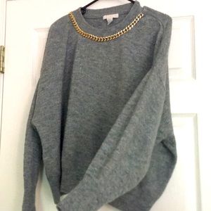 Gray H&M sweater with attached chain